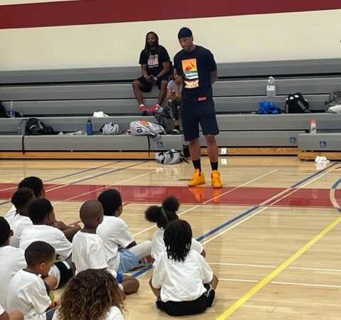 Derozan talking to kids